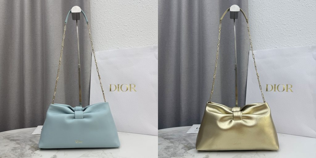 Blue and Metallic Gold Replica Dior Bow Bag — luxury handbag with signature bow detail, displayed in a minimalist setting